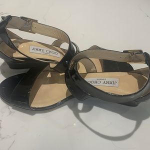 Jimmy Choo black patent wedge. Dress up or down.